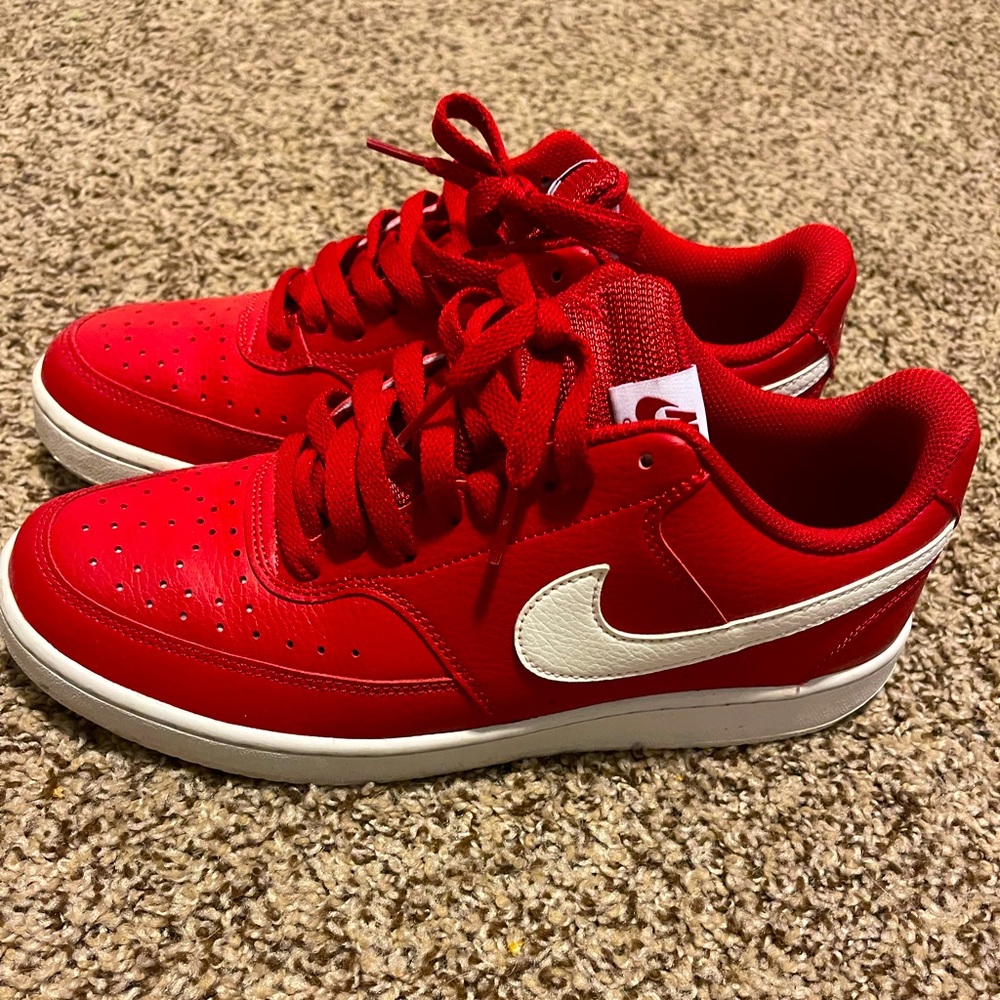 Red low top Nikes